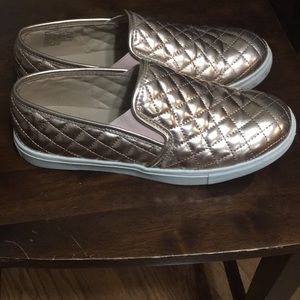 Rose gold slip ons by Candie’s